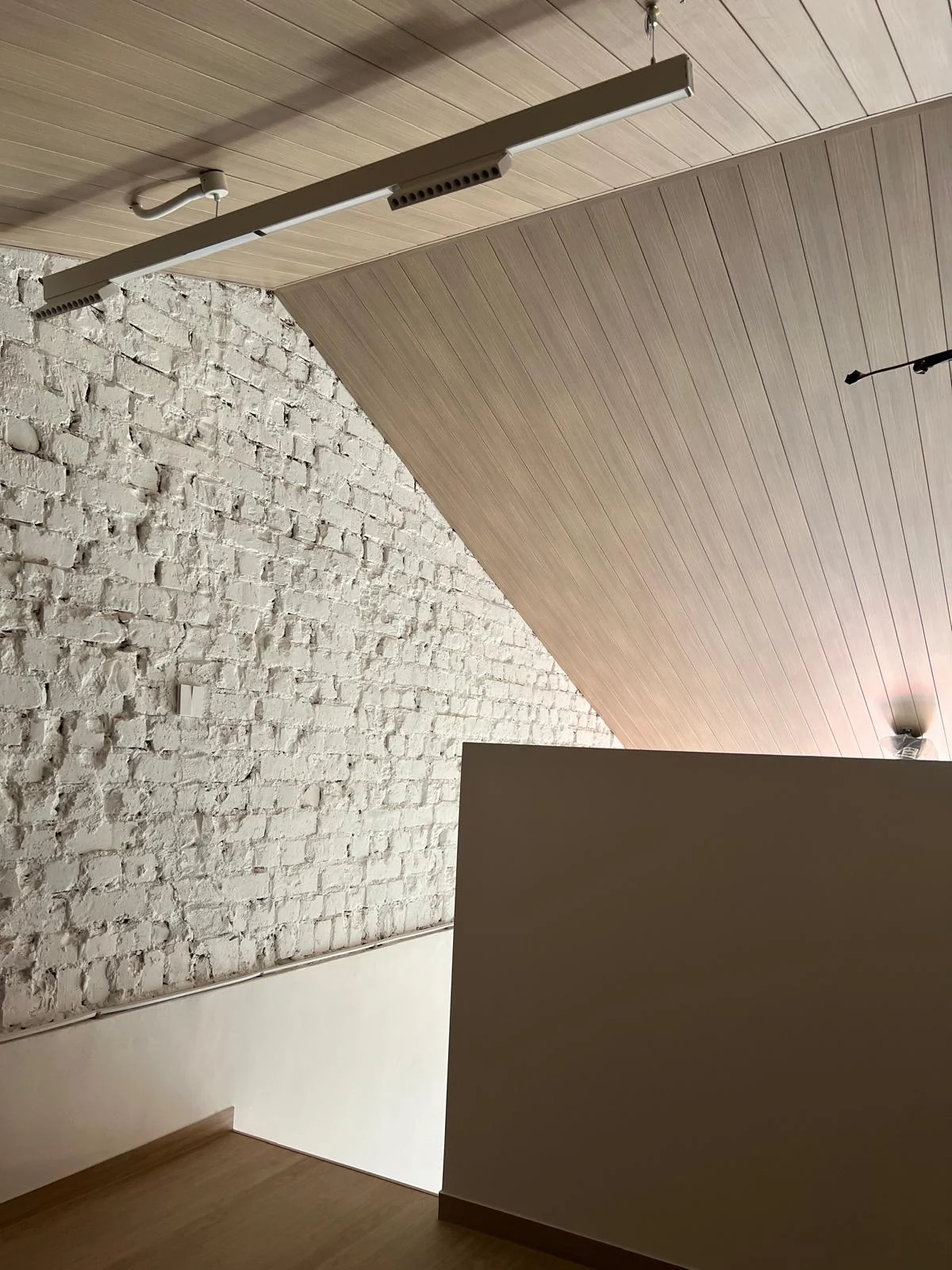 Panel going up, aluminium smart ceiling supplied by Alu-R Pro in Singapore